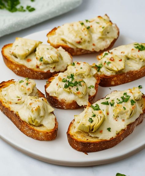 Artichoke Bruschetta Recipe Baguette Appetizers, Artichoke Crostini, Brushetta Appetizers, Baguette Appetizer, Artichoke Bruschetta, Winter Meals, Bruschetta Recipe, Artichoke Hearts, Hors D'oeuvres