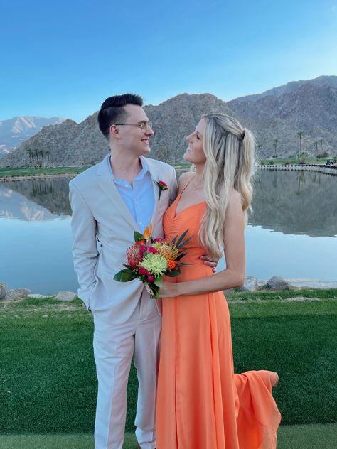 Desert vibes wedding with true orange bridesmaid dresses and tan groomsmen suits. Orange And Tan Prom, Prom Couples Orange, Prom Dresses Prange, Orange Prom Dress With Date, Prom Dresses 2022 Orange, Orange Prom Couple, Tan Tux, Tux Prom, Tan Groomsmen Suits