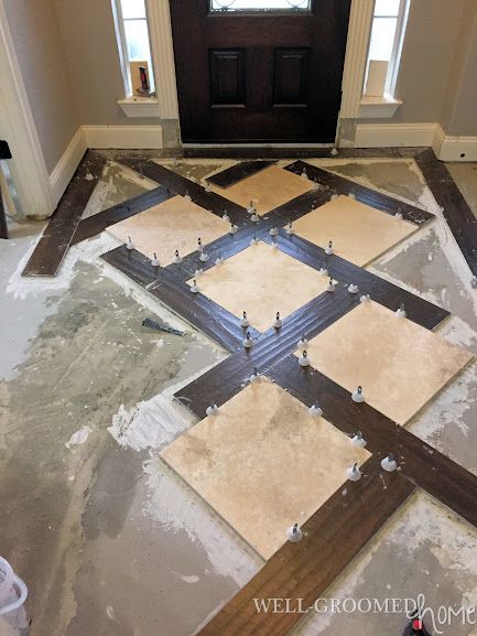 Installing Wood Look Tile - Well-Groomed Home Wood And Tile Flooring Combination, Entrance Flooring Ideas, Wood Look Tile Floor, Entryway Tile, Foyer Flooring, Entryway Flooring, Floor Tile Design, Flooring Inspiration, Wood Look Tile