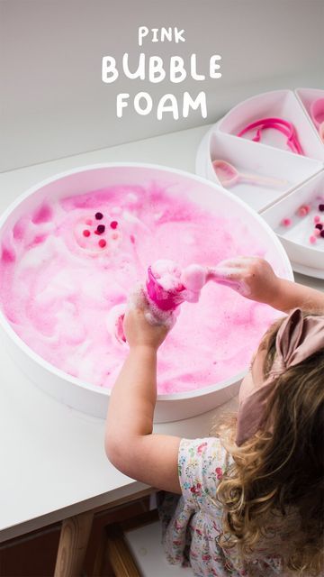 Inspire My Play ® on Instagram: "PINK BUBBLE FOAM . Save this one for some Valentine’s themed sensory play next month! 💕 . Bubble foam is such an easy activity to set up but such a fun alternative to regular water play! We got a good hour of independent play out of this! . 1. To make bubble foam place 1/2 cup of tear-free bubble bath in a bowl with 1 cup of water. You can use dish soap instead but just be aware this may sting their eyes if they rub them. . 2. Add a few drops of pink food colour Valentine Sensory, Bubble Play, Bubble Activities, Outdoor Activities For Toddlers, Bubble Foam, October Activities, Color Of The Week, Toddler Outdoor, Pink Food