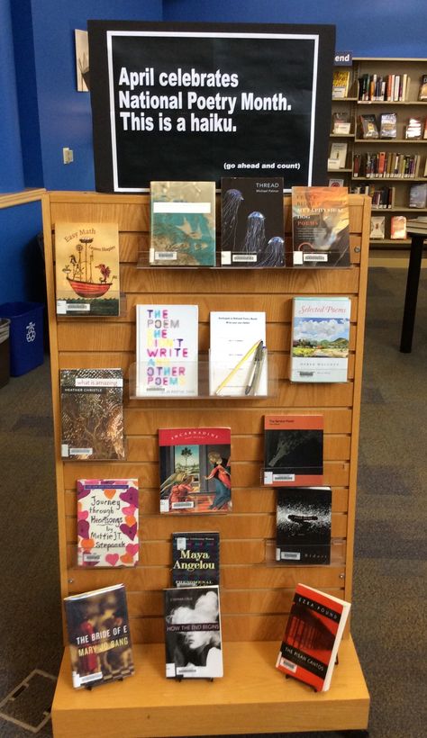 Themed Book Displays, Monthly Book Displays, Library Celebration Ideas, Library Displays Elementary, April Book Displays, May Book Displays, High School Library Decorating Ideas, Poetry Month Library Display, Book Display Ideas Library