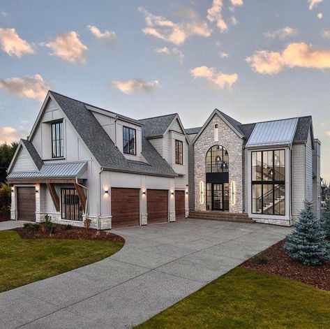 THAD INC created this beautiful house that blends old-world European charm with contemporary sophistication, located in Calgary, Alberta. House Exterior Trends, Staircase Window, Exterior Siding Colors, European Aesthetic, Modern European, Trends For 2024, Hot Tub Outdoor, Calgary Alberta, Contemporary Luxury