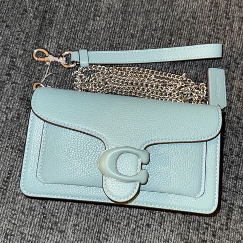 Authentic Brand New With Tags Limited Edition Sold Out Color Coach Tabby Wristlet Bag Silver/Aquamarine (Blue/Green) Polished Pebble Leather Fabric Lining Outside Open Pocket Inside Multifunction Pocket Two Credit Card Slots Pushlock Closure Detachable Wrist Strap Detachable Chain Strap 23" Drop For Shoulder/Crossbody Wear Length: 7.25" Height: 4.25" Width: 1.25" Style Number Cj925 “A Modern Take On An Archival 1970s Coach Design, Our Structured Tabby Wristlet Is Crafted Of Polished Pebble Leath Billionaire Luxury, Coach Tabby, Wristlet Bag, Polished Pebble, Bag Silver, Signature Hardware, Aquamarine Blue, Leather Fabric, Wrist Strap