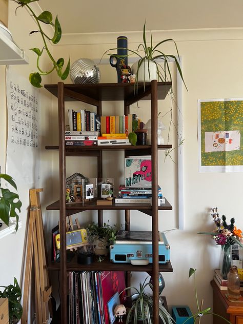 walnut stained display shelf with vinyls, books, plants, and disco ball decor Artsy Shelves, Eclectic Shelves, Messy Shelf Aesthetic, Cluttered Shelf Aesthetic, Record Shelf Aesthetic, Maximalist Shelf, Shelf Decor Living Room Maximalist, Shelf Decor Maximalist, Shelf Decor Aesthetic