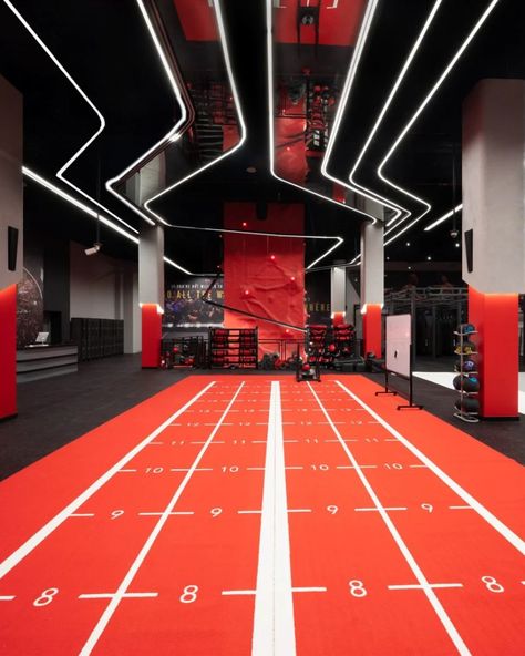 The “UFC GYM” located in Silicon Central, Dubai is a state-of-the-art fitness facility that offers a unique championship experience for its members. 
#lovethatdesign #ufcgym #gymdesign #corporate Gym Branding Design, Futuristic Gym, Motorcycle Showroom Design, Gym Reception, Sports Training Facility, Ufc Gym, Gym Architecture, Gym Design Interior, Luxury Gym