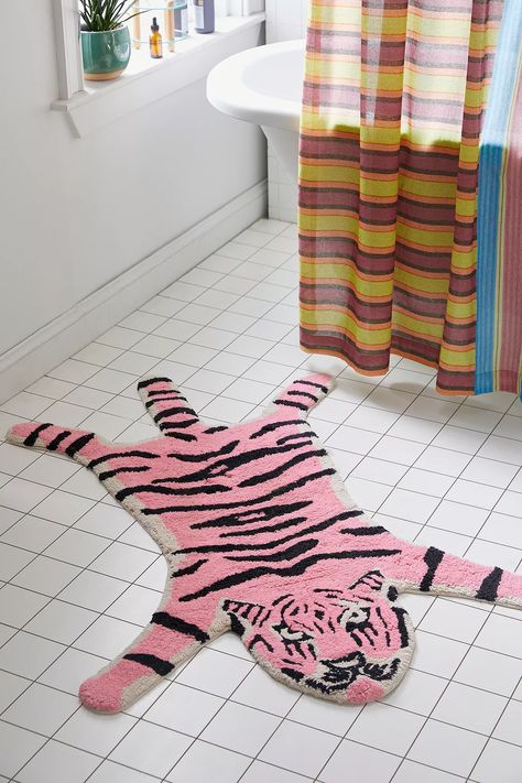 Take a walk on the wild side by turning your bathroom into a jungle with this tiger-shaped bath mat. Shaped like a li’l tiger in a fluffy, tufted cotton that’s so soft on feet when you’re stepping out of the shower. We also love it used around your space as a fun area rug. Tiger Bath Mat, Urban Outfitters Bathroom, Tiger Silhouette, Funky Bathroom, Cartoon Bathroom, Small Bathtub, Tiger Rug, Pink Tiger, Walk On The Wild Side