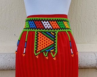 Zulu warrior doll | Etsy South African Jewelry, Leg Accessories, Zulu Warrior, Zulu Women, South African Flag, African Theme, African Dolls, Yarn Dolls, Folk Art Dolls