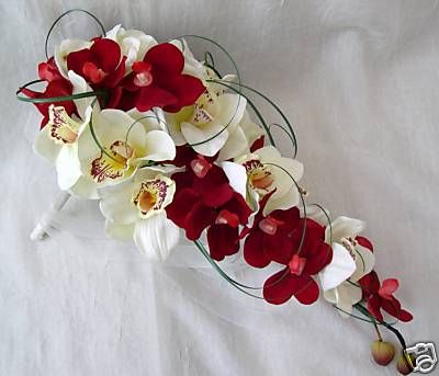 Red and white orchid bouquet. #orchids #flowers #bouquet Wedding Bouquets Orchids And Roses, Orchid Bouquet Wedding, Ivory Wedding Flowers, Red Orchids, Orchid Bouquet, Red Bouquet Wedding, Red Wedding Flowers, Artificial Flowers Wedding, Bouquets