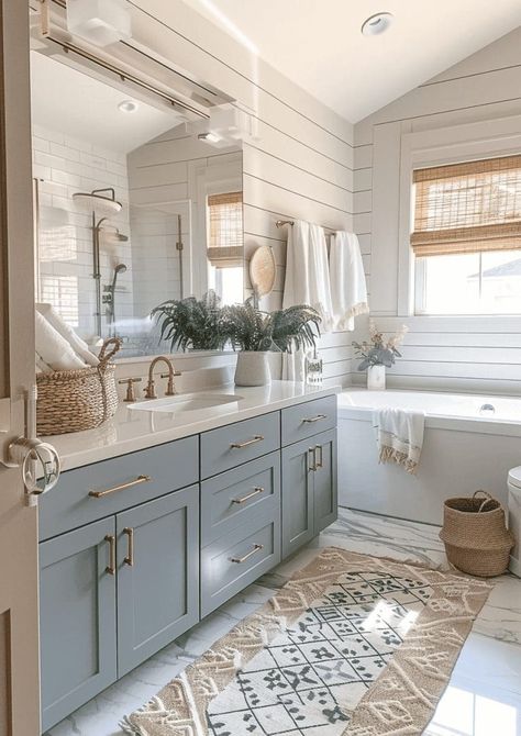 27 Beautiful and Soothing Coastal Bathroom Ideas 70 27 Beautiful and Soothing Coastal Bathroom Ideas Lakehouse Bathroom Decor, White Grey Blue Bathroom, Belgian Design Interiors, Dream Guest Bathroom, Tan And Blue Bathroom Ideas, Bathrooms With Blue Cabinets, Simple Coastal Bathroom, Grey And Blue Bathroom Ideas Colour Schemes Master Bath, Coastal Shiplap Bathroom