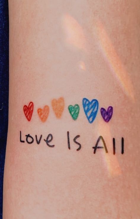 Small Rainbow Heart Tattoo, Lgbtqia Tattoo Ideas, Love Is Love Tattoo Pride, Love Is Love Tattoo, Ally Tattoo, Equality Tattoo, Heartstopper Tattoo, Rainbow Heart Tattoo, Gay Tattoos