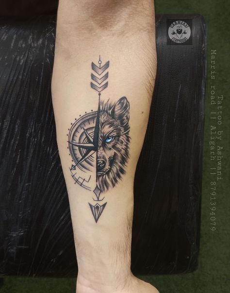 Wolf with compass tattoo Tatos Men Arm, Wolf With Compass Tattoo Design, Tattoo Ideas For Men Strength, Wolf Compass Tattoo Design, Meaningful Forearm Tattoo For Men, Wolf And Compass Tattoo, Lion And Compass Tattoo, Dövme Tasarımları Erkek, Tattoo Ideas Boys