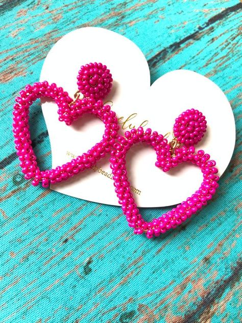 Beaded Heart Earrings are the perfect accessory for any occasion. Beaded Heart earrings are sure to turn heads. Made with colorful glass beads and delicate silver wire, these earrings are both beautiful and durable. Beaded Heart Earrings, Hot Pink Earrings, Beaded Jewelry Earrings, Handmade Beaded Earrings, Pink Heart Earrings, Beaded Heart, Valentines Earrings, Prom Earrings, Handmade Earrings Beaded