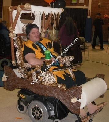 Homemade Fred Flintstone and Flintmobile Wheelchair Costume: My adult son is in a wheelchair and every Halloween I make him a costume and I always try to incorporate his wheel chair into his costume. This year's Stroller Costume, Wheelchair Costumes, Costumes For Work, Eve Costume, Best Halloween Costumes Ever, Yellow Crafts, Crazy Costumes, Fred Flintstone, Horse Costumes