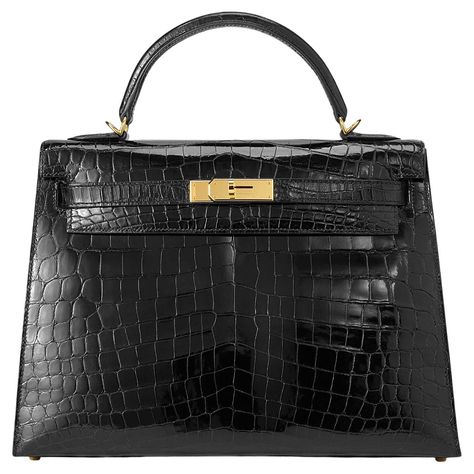 Hermès Kelly Sellier 32 in noir and niloticus crocodile leather with gold hardware. The bag has been worn but still in very good condition: small scratches on the hardware, small spots on front and back of the bag and small marks inside the bag. Comes as full set including Cites. Stamp D (2019) Kelly 32, Kelly Sellier, Hermes Kelly Bag, Sunglasses Logo, Shopping Photography, Jane Birkin, Patek Philippe Nautilus, Cartier Love, Crocodile Leather