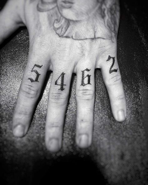 Numbers 5462 tattooed on the left hand’s fingers Sergio Ramos Tattoo, Finger Tattoos For Men, Tattoos On Fingers, Man Tattoo Ideas, Tattoo Numbers, Fingers Tattoo, Tattoo Side, Tattoos Hand, Man Tattoo