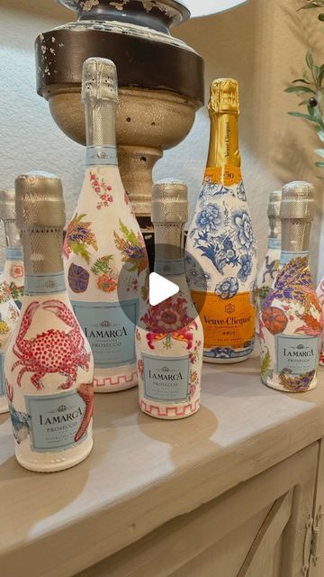 12K likes, 135 comments - tredwayhomedesigns on January 24, 2024: "These decorative bottles make the perfect gifts and it’s so easy to make. Whether you gift to a friend or hostess, this also could be a...". Decoupage Prosecco Bottles, Paper Mache Wine Bottles, Painting Liquor Bottles Diy, Decoupage Wine Glasses, Painting Prosecco Bottles, Mod Podge Champagne Bottle With Napkins, Napkin Wine Bottle Decoupage Ideas, How To Decorate A Champagne Bottle, Modge Podge Champagne Bottle Napkins