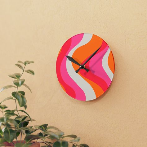 Our groovy 60's hippie swirl acrylic wall clock not only tells time, but it dresses up your wall and transforms your space into a groovy oasis of retro vibes and funky flair! The fun mod retro color palette of pinks and orange brings a pop of color to your wall. Say goodbye to boring old wall clocks, cuz tick-tock, it's funk o'clock! Our modern take on the classic wall clock, where the acrylic material allows the richness and vibrancy of our designs to shine! True to our style, these clocks are Funky Wall Clocks, Wall Clock Classic, 60s Hippie, Acrylic Wall Clock, Retro Color Palette, Clock Painting, Spatial Design, Classic Wall, Mid Century Mod