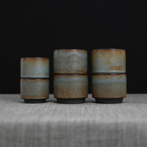 Blue-brown stackable coffee cups, each is hand-thrown from black clay. In two sizes. The smaller cups work well for espresso, flat white and the larger for cappuccino. #pottery #potterystudio #ceramics #keramik #ceramique #coffeecup #tumbler #handmade #minimalism Pottery Espresso Cups, Espresso Cups Ceramic, Brown Cups, Clay Cup, Brown Clay, Black Clay, Flat White, Pottery Ideas, Pottery Studio