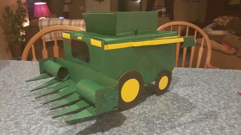 JOHN DEERE COMBINE VALENTINE BOX Tractor Valentines Boxes, Combine Valentine Box Ideas, John Deere Valentine Box Ideas, Monster Truck Valentine Box Ideas, Box Tractor Cardboard, Monster Truck Valentines Boxes Boys, Valentines Box Monster Truck, Unique Valentine Box Ideas, Diy Valentine's Box