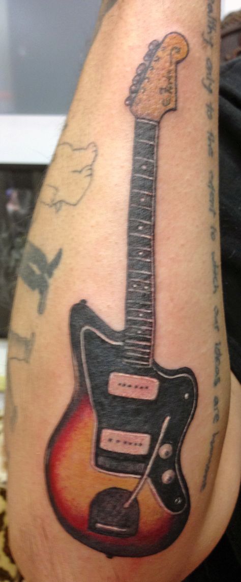 Tattoo #8 - My favorite guitar, a Fender JazzMaster Strength Tattoo Designs, Cat Face Tattoos, Wing Tattoo Men, Electric Tattoo, Fender Jazzmaster, Lily Flower Tattoos, Key Tattoos, Armband Tattoo Design, Guitar Tattoo