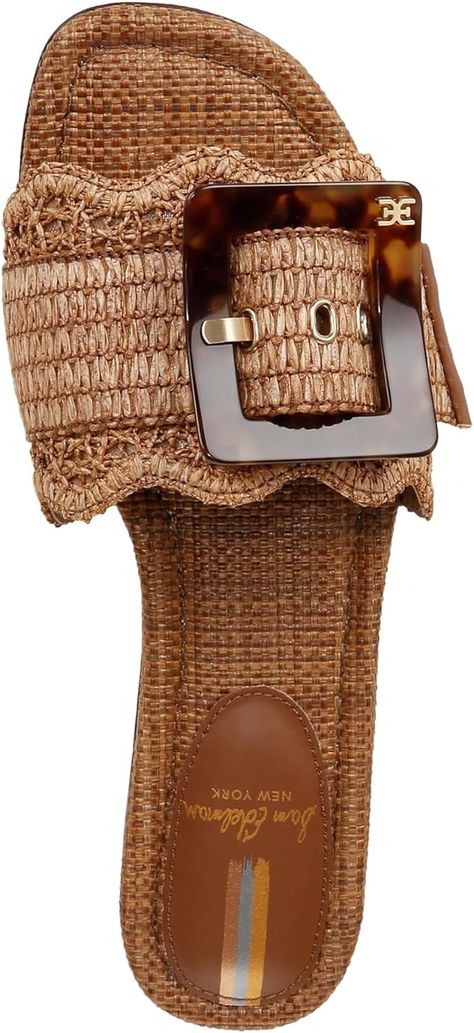 Sam Edelman Bambi
The Bambi slide sandals boast a raffia upper complemented by an oversized resin buckle. Play with proportion and pack a punch.
Heel Height: 0.5 Inches
Closure: Slip-On Fancy Shoes, Woven Raffia, Girly Shoes, Perfume Gift Sets, Fabric Gift Bags, Sandal Women, Shoe Game, Sandals Summer, Sam Edelman