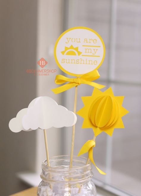 "The perfect centerpiece for your little one's birthday party or baby shower. Sunshine Centerpieces include 3 pieces in each set.  They can be added to a floral arrangement or displayed as pictured with jar filler. You can even use them as a cake topper! Displayed in 16oz (Pint) Mason Jar. JAR AND FILLER ARE NOT INCLUDED. The pieces are shipped flat and need minor \"fluffing\" when setting up for display. Find more Sunshine decorations here: https://www.etsy.com/shop/boehmershop?search_query=sun Sunshine Centerpieces, Photo Banner First Birthday, Sunshine Decorations, Sunshine First Birthday, Sunshine Party, Jar Fillers, Sunshine Baby Showers, Birthday Photo Banner, First Year Photos