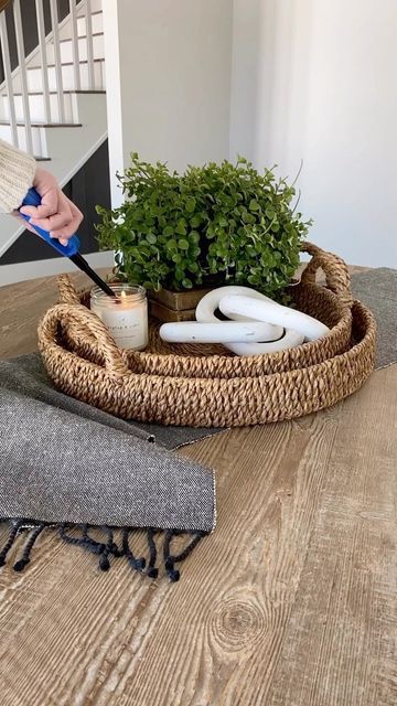 Interior Delights on Instagram: "Using things from around the house, using baskets and trays bring your decorative items together to give a less cluttered appeal 🌿… our new round sea grass baskets are perfect for just this www.interiordelights.net #interiordelights #interiordesign #homedecor #designhacks #centerpieces #centerpieceideas #shopping #decorboutique #parkercolorado #parkercoloradobusiness #ecommercebusiness #artdeco #modernfarmhouse #traditionaldecor #cottagestyle #happyplace #bringj Basket Coffee Table Decor, Basket Tray Decor, Interior Delights, Basket Decor Ideas, Grass Basket, Wicker Tray, Ottoman Styling, Wood Basket, Basket Planters