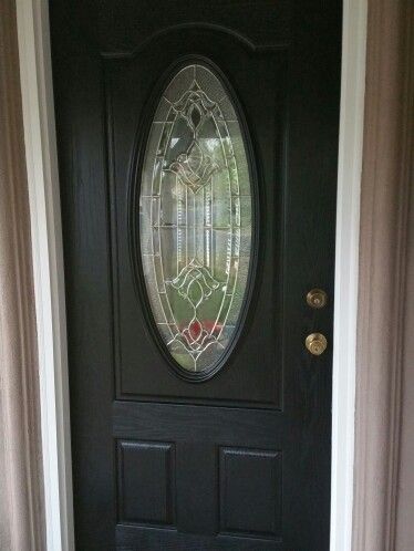 Black front door. Gorgeous! Black Front Door With Window Panes, Black Front Door Oval Window, Black Window Front Door, Goth Front Door, Front Door Oval Glass Window, Front Door With Oval Glass Window, Front Door With Oval Window, Oval Window Front Door, Oval Glass Front Door