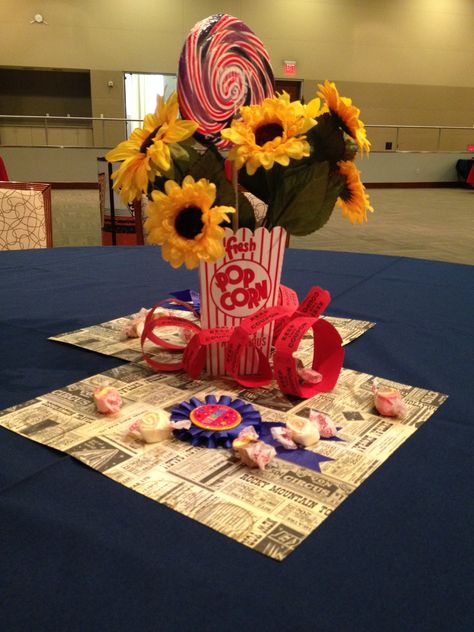 State fair centerpiece #sunflowers #popcorn #tickets County Fair Decorations Ideas, State Fair Decorations, County Fair Decorations, State Fair Party, State Fair Theme, Country Fair Party, County Fair Theme, Ffa Banquet, Hamburger Party