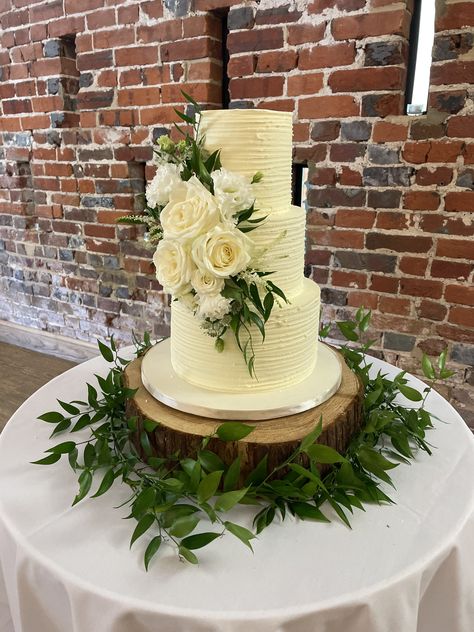 3 tier textured buttercream wedding cake with diagonal arrangement of fresh flowers and foliage Three Tiered Wedding Cake With Flowers, Textured Buttercream Wedding Cake, Textured Buttercream, 2 Tier Wedding Cakes, Cake With Flowers, Fresh Flower Cake, Buttercream Wedding Cake, Wedding Cakes With Flowers, Cake Board