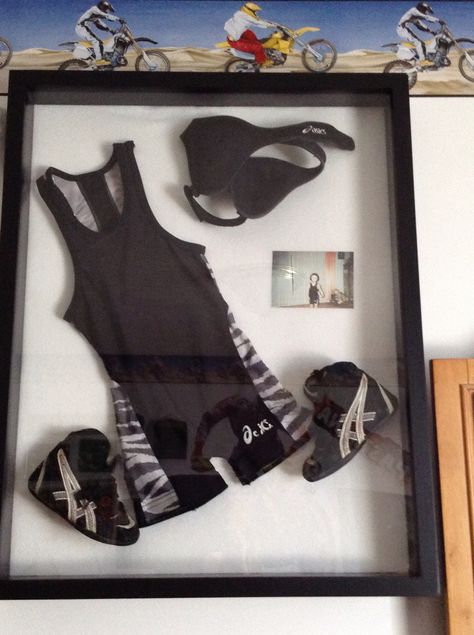 My sons first wrestling singlet,shoes,and head gear. Love his shadow box! Wrestling Pins Display, Wrestlers Diet, Wrestling Stickers, Youth Wrestling, Wrestling Quotes, Trophy Display, Wrestling Posters, Wrestling Shirts, Wrestling Singlet