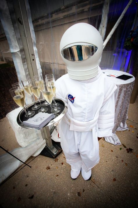 24 creative ways to throw a futuristic and space-themed party. Get inspired on PartySlate. #themedparty #themedpartyideas Sci Fi Party Ideas, Space Themed Halloween Party, Nasa Themed Party, Elegant Space Theme Party, Et Party Theme, Future Theme Event, Space Themed Event Decor, Intergalactic Party Theme, Future Party Theme Decor