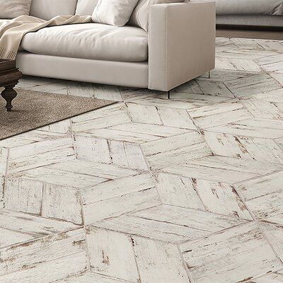 This product is the perfect blend of wood-look porcelain with contemporary and unique sizes and shapes. The wood pattern is a result of state-of-the-art digital imaging and printing techniques to give a truly realistic look with the durability of porcelain tile. Color: Urban White | Medici Mosaics 7" x 17" Porcelain Wood Look Wall & Floor Tile Porcelain in White, Size 17.0 H x 7.0 W x 0.37 D in | Wayfair Lvt Flooring Tile Look, Ceramic Floors That Look Like Wood, Click Tile Flooring, White Wood Tile Floor, Distressed Flooring, Pool House Flooring Ideas, Snap In Flooring, Tile Floor In Living Room, Faux Wood Tile Floor