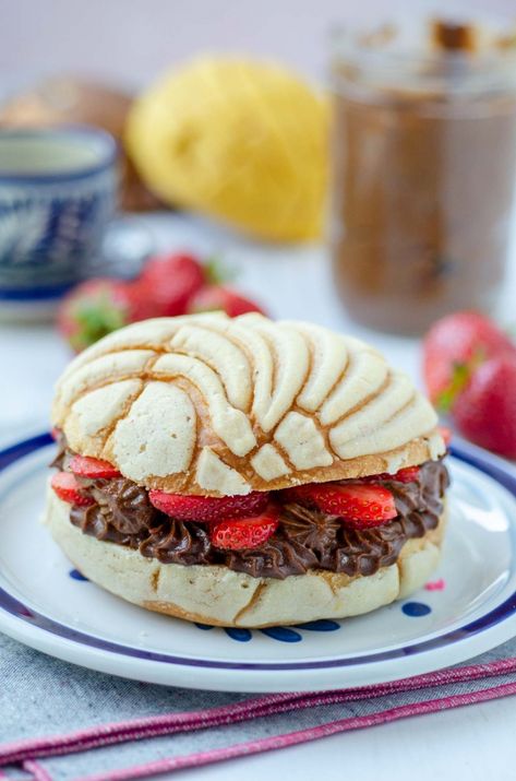 Stuffed Conchas with Vegan Nutella and Strawberries « Dora's Table | Vegan Mexican Recipes Nutella And Strawberries, Mexican Dessert Table, Premixed Cocktails, Mexican Sweet Breads, Vegan Nutella, Vegan Breakfast Easy, Mexican Snacks, Vegan Mexican Recipes, Easy Vegan Dessert