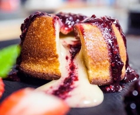 15 Molten Lava Cakes You Could Fall Hard For: White Chocolate Lava Cake White Chocolate Lava Cake, Blackberry Sauce, Lava Cake Recipes, Molten Lava Cakes, Molten Lava, Chocolate Lava, Chocolate Lava Cake, Lava Cake, A Piece Of Cake