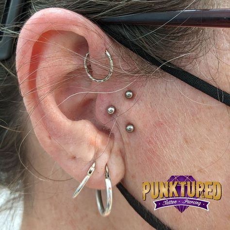 Gorgeous triple tragus piercing by @stabxdaddy 😍 Find them at Off Ya Tree Browns Plains 💉 . . . #punktured #punkturedpiercing #punkturedaus #piercing #piercingsofinstagram #piercingaddict #piercinglove #piercing2me #piercinglife #piercinginspiration #piercingideas #earpiercings #earpiercing #traguspiercing #conchpiercing #daithpiercing #septopiercing #tonguepiercing Triple Tragus Piercing, Tragus Piercing Earrings Double, Tragus Bar Piercing, Anti Tragus Hoop Piercing, Tragus And Anti Tragus Piercing, Tongue Piercing, Daith Piercing, Conch Piercing, Tragus Piercings