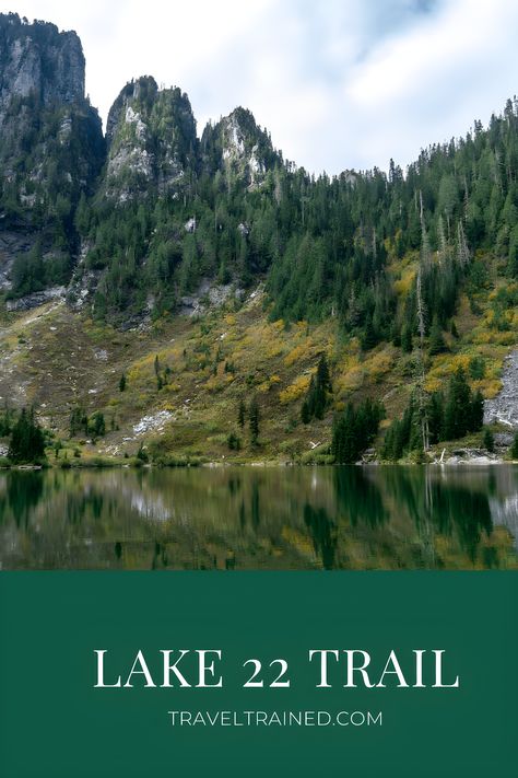 Discover the breathtaking beauty of Washington's Lake 22 Trail! This scenic 5.4-mile roundtrip hike offers lush greenery, cascading waterfalls, and stunning mountain views. As you ascend through old-growth forests, you'll be rewarded with the serene Lake 22, surrounded by rugged cliffs and often reflected by the misty sky.  #Lake22 #WashingtonHikes #hiking Hiking Hats For Women, Washington Lakes, Best Hiking Gear, Couples Camping, Lightweight Hiking Boots, Hiking Water Bottle, Washington Hikes, Best Hiking Boots, Best Hiking Shoes