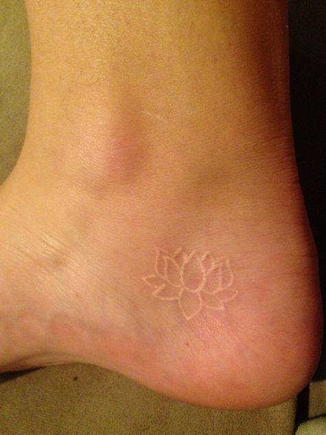 Small white ink lotus tattoo, 3 weeks Tiny Lotus Tattoo, Simple Lotus Flower Tattoo, Simple Lotus Tattoo, Lotusblume Tattoo, Small Lotus Tattoo, Cute Ankle Tattoos, Tattoos 2024, Ankle Tattoo Designs, Lotus Tattoo Design