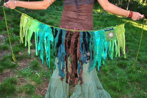 TatteRed Pixie Skirt | Intergalactic Apparel | etsy.com. I just fell in love with this tattered skirt/wrap when I saw it. I would love to DIY something like this to wear over my yoga pants. You can… Tattered Clothes, Tattered Skirt, Pixie Skirt, Wrap Skirts, Fairy Clothes, Woodland Fairy, Wrap Belt, Festival Clothing, Fairy Costume