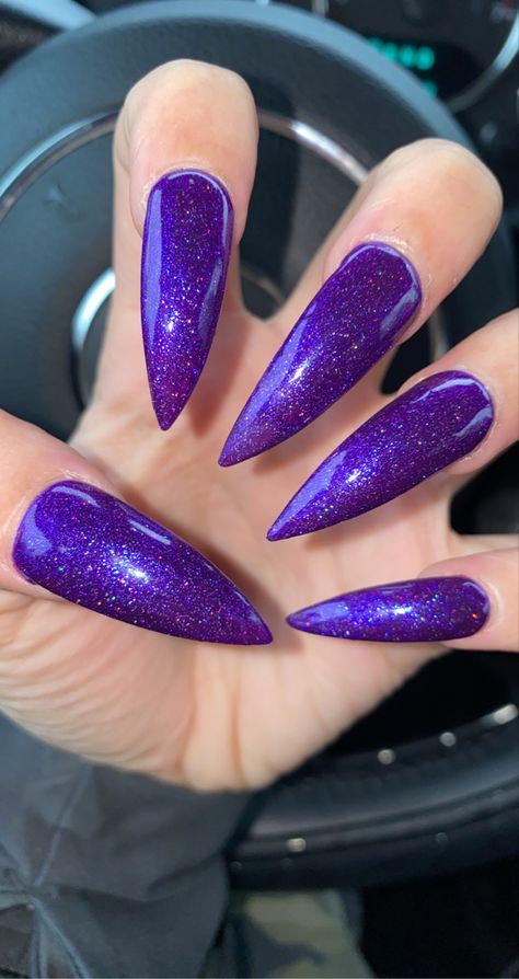 Gotta have purple nails to match my cars! #zebra #moon #galaxy #crossnails #emo #emonails #teal #nails #blackandwhite #almondnails #blacknails #Zebranails #coffinshape #stripenails #whitenails #fashion #cute #blonde #summer #nailart #naildesigns #bluenails #girls #pink #look #rednails #roses #leopard #cool #art #music #car #design #makeup #followme #instagram #spring #goldnails #maroon #purplenails Sharp Nails Ideas, Hot Purple Nails, Crazy Purple Nails, Purple Nails Stiletto, Blue Purple Nails, Short Purple Stilleto Nails, Purple Stiletto Nails Design, Black And Purple Stiletto Nails, White Stiletto Nails