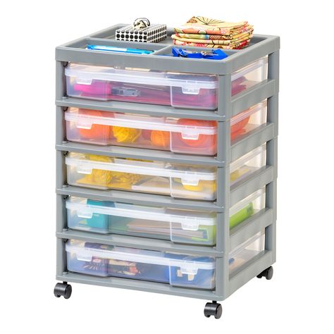 "Purchase IRIS Gray 5-Case Scrapbook Cart at Michaels. com. Calling all scrapbook lovers. This five case scrapbook table chest makes organizing your scrapbook projects and supplies effortless. Calling all scrapbook lovers. This five case scrapbook table chest makes organizing your scrapbook projects and supplies effortless. Scrapbook cases comfortably hold 12” x 12” paper, scissors, stamps, and more, and rounded corners protect contents from damage. Easily remove the cases for on-the-go projects Craft Storage Cart, 5 Drawer Storage, Art Supplies Storage, Rolling Storage Cart, Scrapbook Organization, Arts And Crafts Furniture, Rolling Storage, Plastic Organizer, Storage Cart