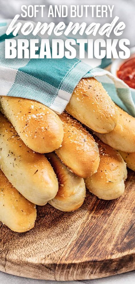 A stack of freshly baked homemade breadsticks wrapped in a tea towel on a serving platter. Bread Sticks Recipe Bread Machine, Yeast Breadsticks, Easy Homemade Breadsticks, Vegan Dough, Stand Mixer Bread, Easy Breadsticks, Appetizer Bread, Breadsticks Easy, Stand Mixer Recipes