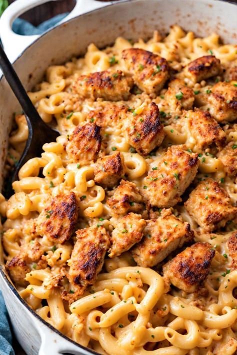 Cajun Chicken Mac and Cheese Recipe

Ingredients

- 8 ounces elbow macaroni
- 2 tablespoons olive oil
- 1 pound boneless, skinless chicken breasts, cubed
- 2 tablespoons Cajun seasoning
- 3 tablespoons butter
- 1/4 cup all-purpose flour
- 3 cups milk
- 2 cups shredded sharp cheddar cheese
- 1 cup shredded Monterey Jack cheese
- 1/2 cup grated Parmesan cheese
- Salt and pepper to taste
- 1/4 cup chopped green onions (for garnish)

Full Cooking Instructions on... Elbow Macaroni Recipes With Chicken, White Chicken Chili Mac And Cheese, Cajun Chicken Mac And Cheese, Mac N Cheese Chicken, Chicken And Elbow Macaroni Recipes, Mac And Cheese Recipe Chicken, Macaroni And Cheese With Chicken, Mac And Cheese Box Recipe, Elbow Macaroni Recipes