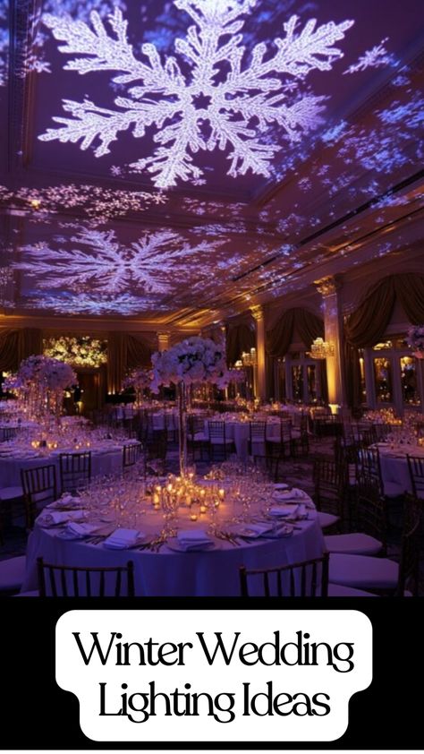 Elegant winter wedding lighting with snowflake projections and soft blue tones enhancing a winter wonderland theme. Winter Wonderland Wedding Ceremony, Wedding Venue Ideas Indoor Receptions, Winter Event Decor, Wedding Lights Indoor, Indoor Reception Decorations, Wedding Venues Indoor Elegant, Winter Wonderland Reception, Magical Wedding Theme, Wedding Lighting Indoor