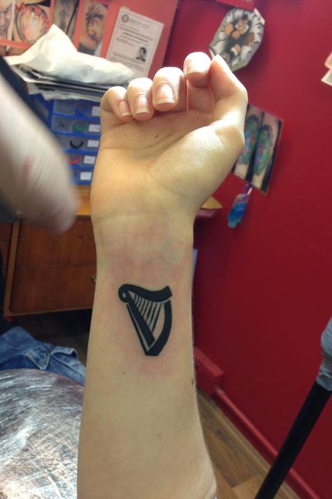 My Guinness harp tattoo I got for my Grandad Guinness Harp Tattoo, Guiness Tattoos, Small Willow Tree, Guinness Tattoo, Weeping Willow Tree Tattoo, Harp Tattoo, Willow Tree Tattoo, Tree Tattoo Ideas, Willow Tree Tattoos