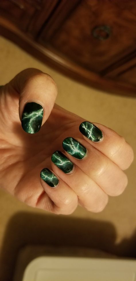 My Hero Academia inspired nails.  Dark green background with bright green lightning.  Based on Deku's green lightning Green Lightning Nails, Deku Nails Art, Deku Nails, Hulk Nails, My Hero Academia Nails, Mha Nails, Bolt Nails, Lightning Bolt Nails, Lightning Nails