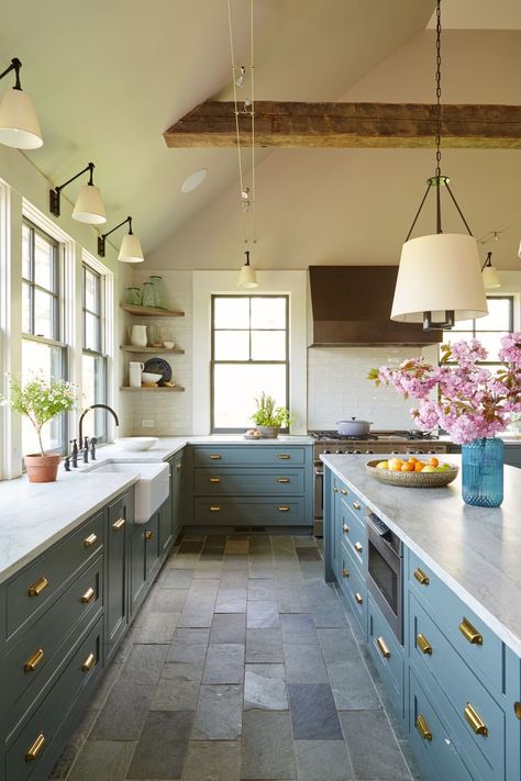 Kitchen Design Slate Floor, Slate Floor Kitchen Farmhouse, Kitchen Lampshade Ideas, Kitchen Stove Between Windows, Kitchen Windows Beside Stove, Kitchen With Gray Wood Floors, Pitched Kitchen Ceiling, Kitchen European Style, Windows Above Stove