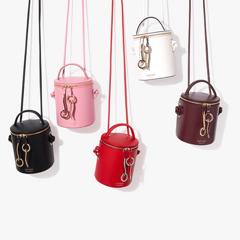 Mini bucket bags complete with top handle and shoulder strap.  Lots of terrific colors. Cosmetics Design, Italian Handbags, Photography Bags, Mini Bucket Bag, Leather Ideas, Jewelry Displays, Mini Bucket Bags, Mini Bucket, Bucket Bags