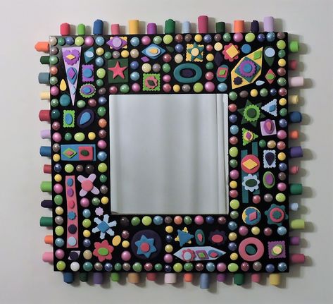 Mirror frame decorated with clay and glass gems. Clay And Mirror Art Design, Diy Mirror Frame Ideas Clay, Mirror Clay Art Ideas Aesthetic, Polymer Clay Mirror Frame Diy, Clay Art Mirror Frame, Clay And Mirror Art Square, Polymer Clay Mirror, Clay Mirror Frame, Decorated Mirrors