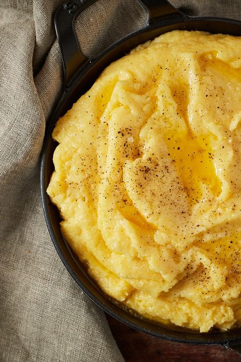 This rich and indulgent polenta recipe from the Aosta Valley is mountain cooking at its best. The polenta is mixed with butter, milk and the region's famous Fontina cheese, making it a perfect side dish to rich stews such as Carbonnade Valdostana. Polenta Dishes, Nye Dinner, Polenta Recipe, Aosta Valley, Polenta Recipes, Fontina Cheese, Traditional Italian Dishes, Butter Milk, Cheese Making